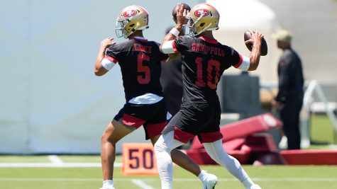 #10 Jimmy Garoppolo and #5 Trey Lance in practice.