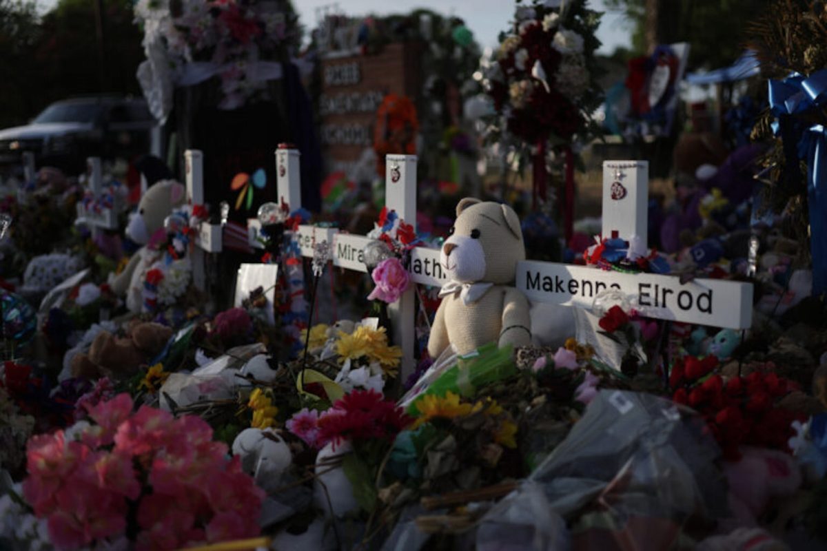 UVALDE, TEXAS - JUNE 03:  Flowers, plush toys and wooden crosses are placed at a memorial dedicated to the victims of the mass shooting at Robb Elementary School on June 3, 2022 in Uvalde, Texas. 19 students and two teachers were killed on May 24 after an 18-year-old gunman opened fire inside the school. Wakes and funerals for the 21 victims are scheduled throughout the week.  (Photo by Alex Wong/Getty Images)