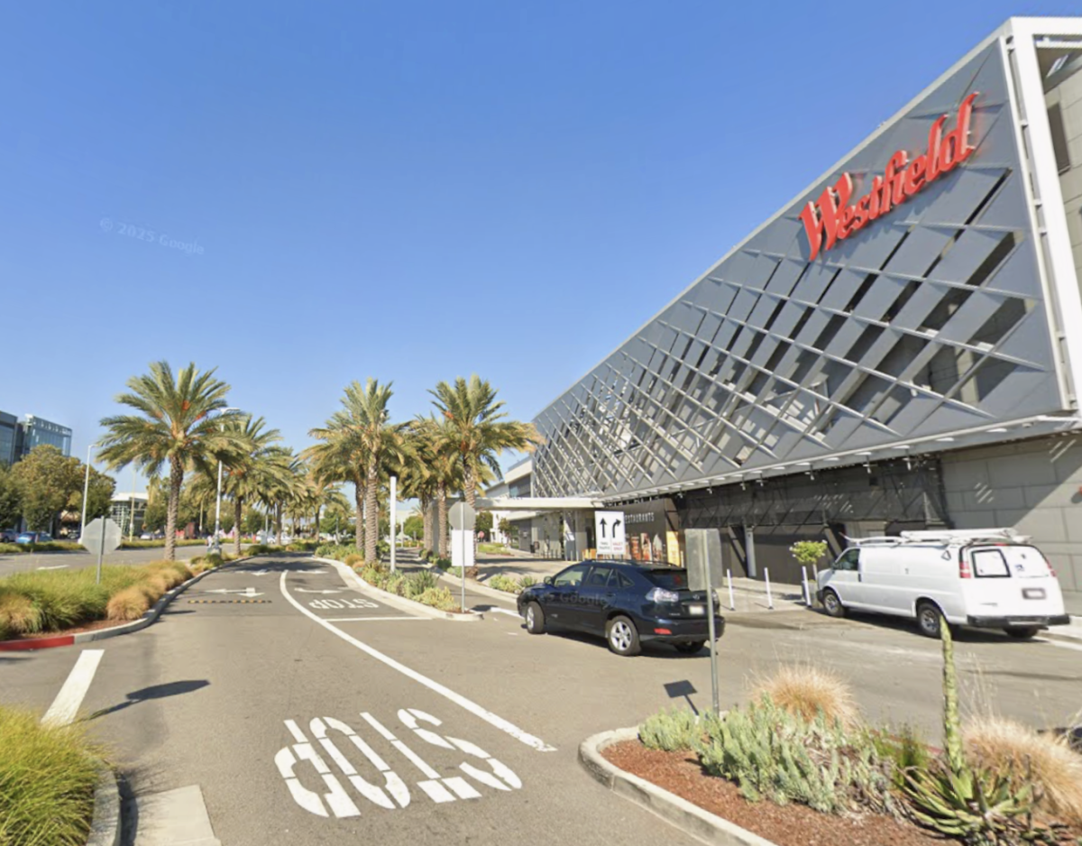 Look at this image of Valley Fair. In what direction would you start walking to get to Mitty?
