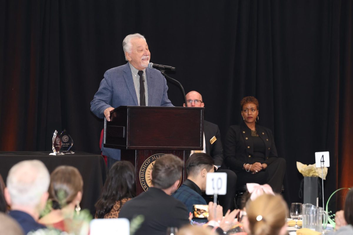 Mr. John Mosunic, AMHS golf coach, delivering a speech in acceptance of his Hall of Honor induction. (Archbishop Mitty)