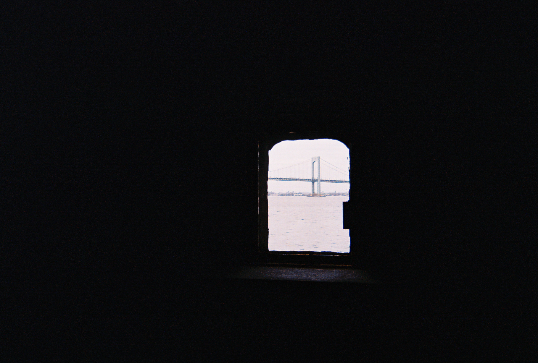 Milk-dunked light blinks through the abyss of the cave.