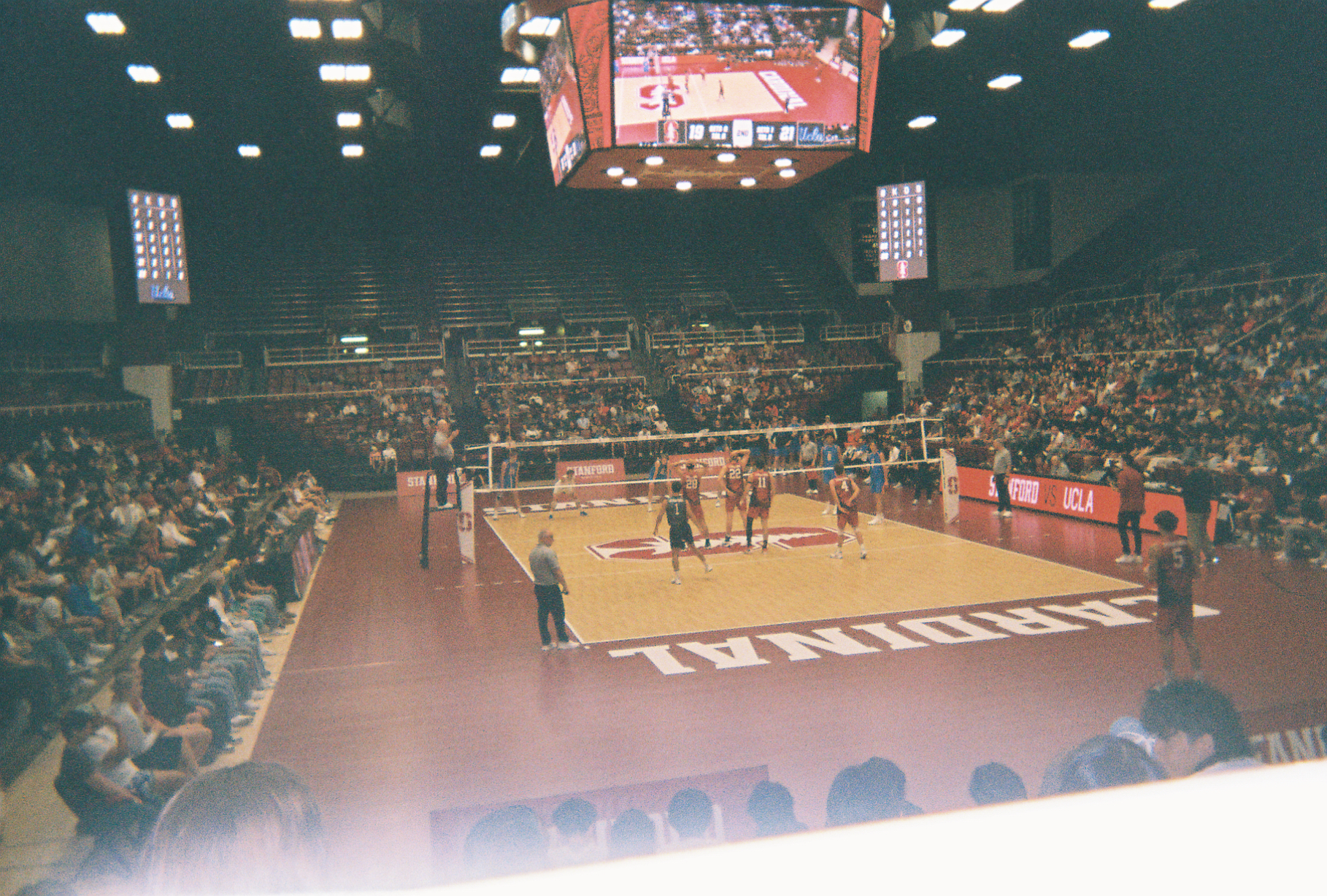 Readying themselves for the next serve, the Cardinal form up under the lights.